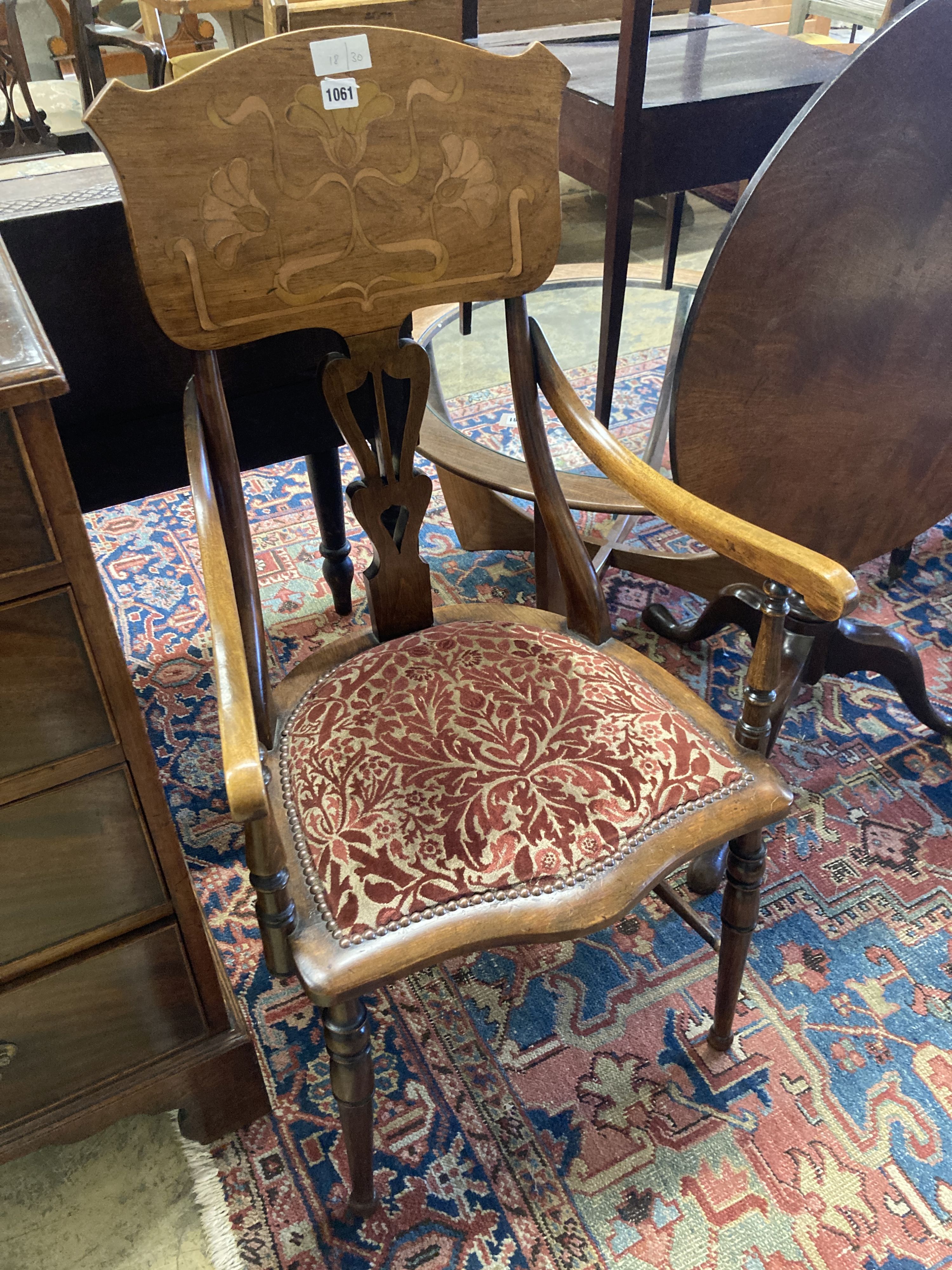 An Art Nouveau marquetry inlaid mahogany and beech elbow chair, width 53cm, depth 54cm, height 104cm